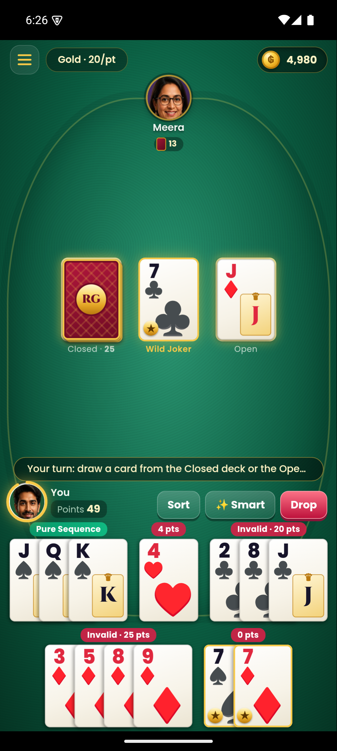 Arranging cards into sequences and sets